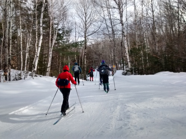 Skiing the groomed trails at Sugar Loaf Touring Center