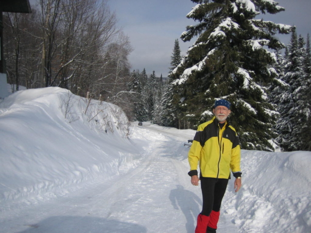 Rob in the snow near the rental house