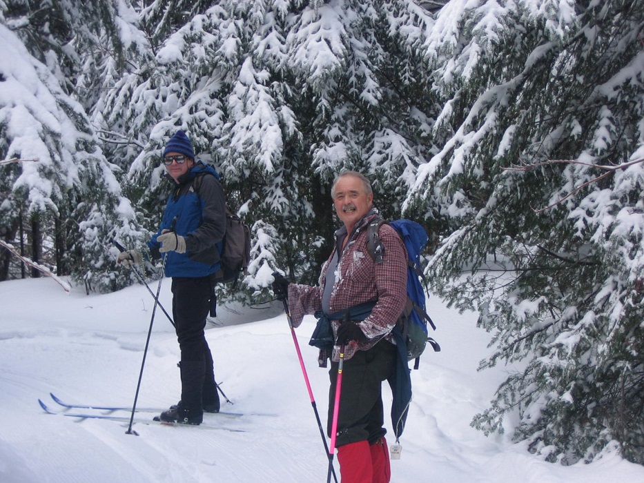 Brian O'Konski and Carl Modig skiing in new-fallen snow