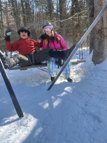 Larry and Marcie on a giant swing along the trail, Lapland Lake Nordic Ski Area